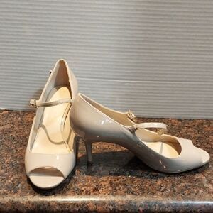 Calvin klein " "Loretta"Elegant Cream Peep-Toe Heels..Size 6.5